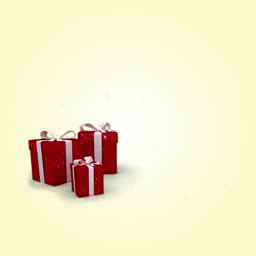 Three red gift boxes with white ribbons on a light yellow background