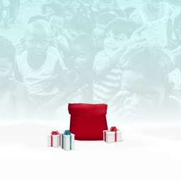 A red Santa Claus sack surrounded by small wrapped gift boxes against a faded background of children