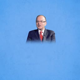 Portrait of Indian politician Arun Jaitley against a blue background