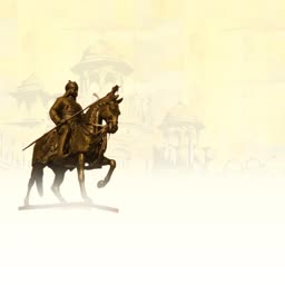 A bronze statue of Maharana Pratap on a horse with a faded historical palace background