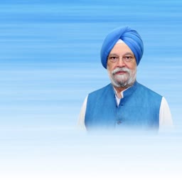 Portrait of Indian politician Hardeep Singh Puri wearing a blue turban and waistcoat