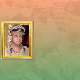 A formal portrait of an Indian police officer in uniform inside a golden frame against a blurred background.