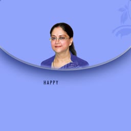 A smiling woman in a professional blue saree on a light purple background