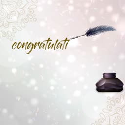 A quill pen writing the word congratulation above an inkwell on a soft bokeh background