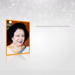 Portrait of an elderly woman framed in orange with a silver bokeh background