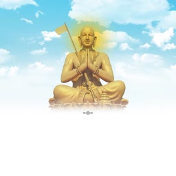 A golden statue of Acharya Samantabhadra in a meditative pose against a blue sky with clouds