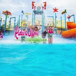 Children enjoying water rides and slides at a colorful water park