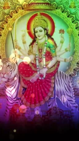 Goddess Durga riding a tiger in a decorative frame