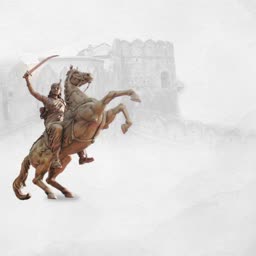 Statue of Rani Laxmibai on horseback with a raised sword in front of a fort