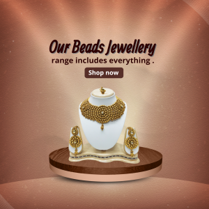 A gold-toned beaded necklace and earring set displayed on a pedestal against a soft, warm brown background.