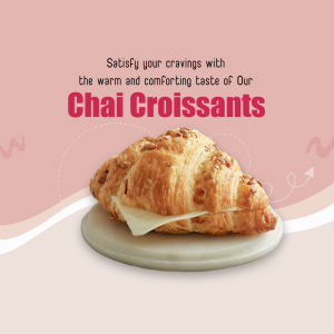 A delicious golden-brown croissant filled with a slice of cheese sitting on a marble plate against a pink background.