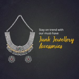 A beautiful silver junk jewellery necklace and earring set displayed against a dark textured background.