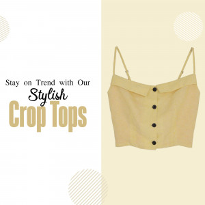 A trendy yellow button-down crop top with spaghetti straps displayed against a neutral background.