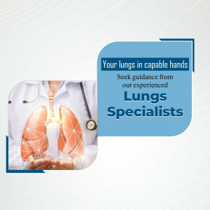A medical professional holding a graphical representation of healthy human lungs to promote lung specialist services.