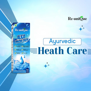 Bottle of Re-Unique Alka Unique Drop, an ayurvedic health supplement, displayed against a blue gradient background.