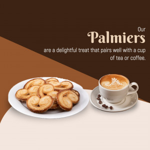A plate of golden brown palmier cookies next to a fresh cup of coffee with latte art on a warm brown background.