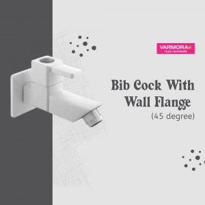 A white Varmora bib cock faucet with a wall flange against a light grey background.