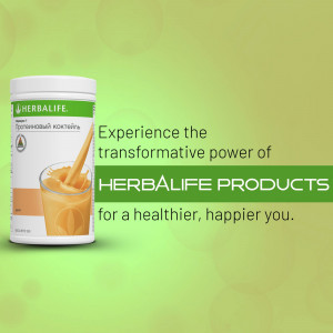 Herbalife Formula 1 protein shake container with a glass of prepared shake on a green background