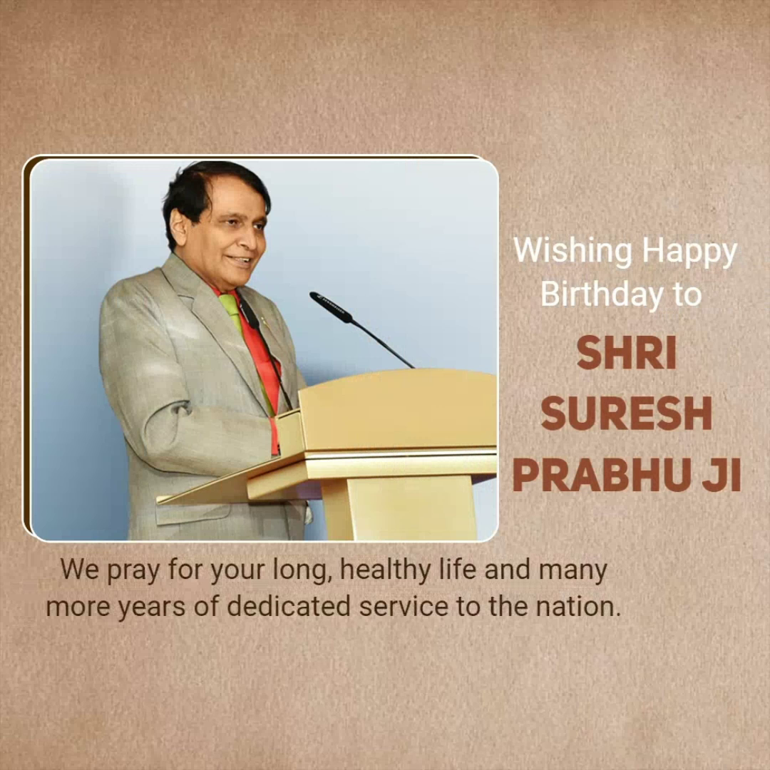 Shri Suresh Prabhu speaking at a podium with a birthday greeting message