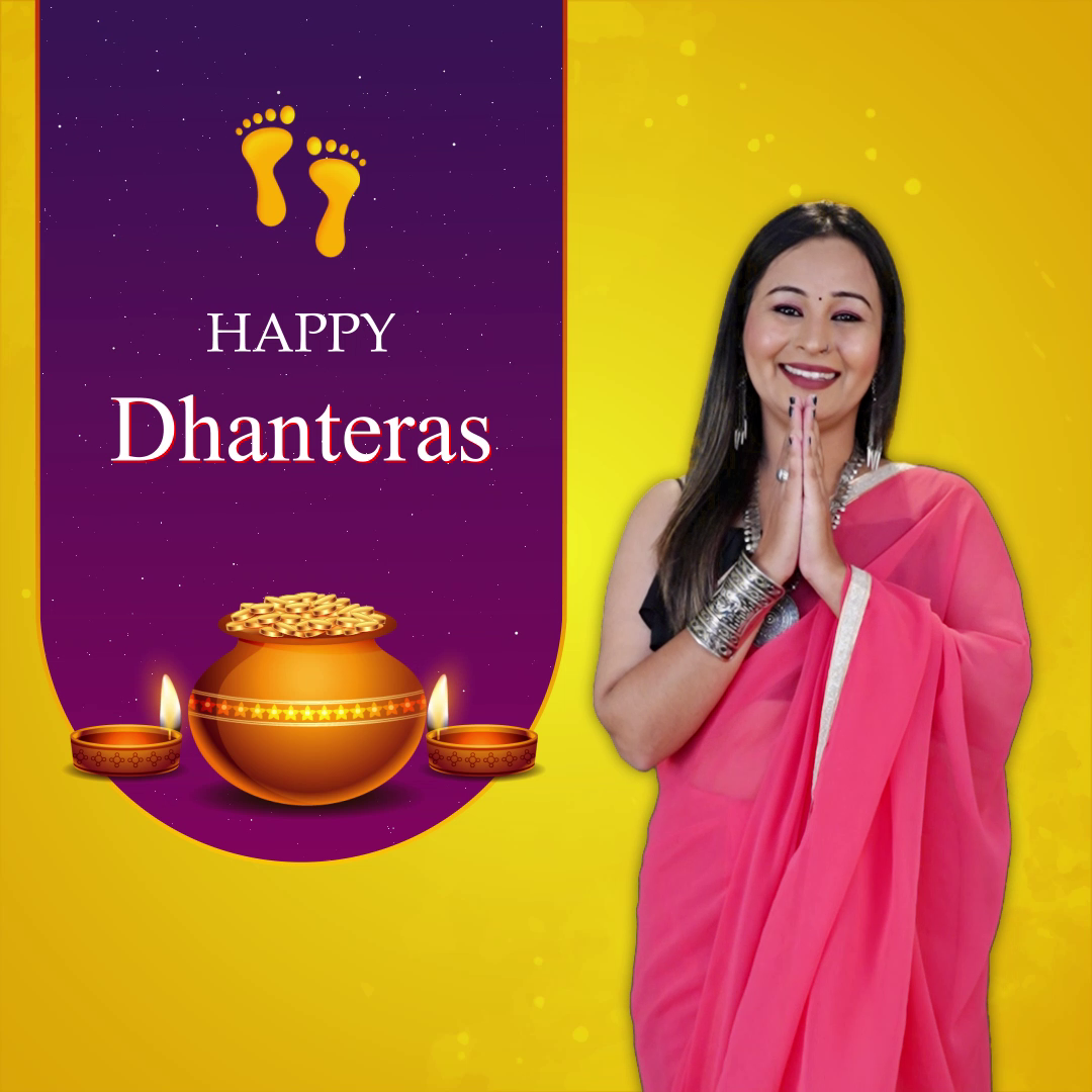 A smiling Indian woman in a pink saree wishing Happy Dhanteras with traditional pot and diyas