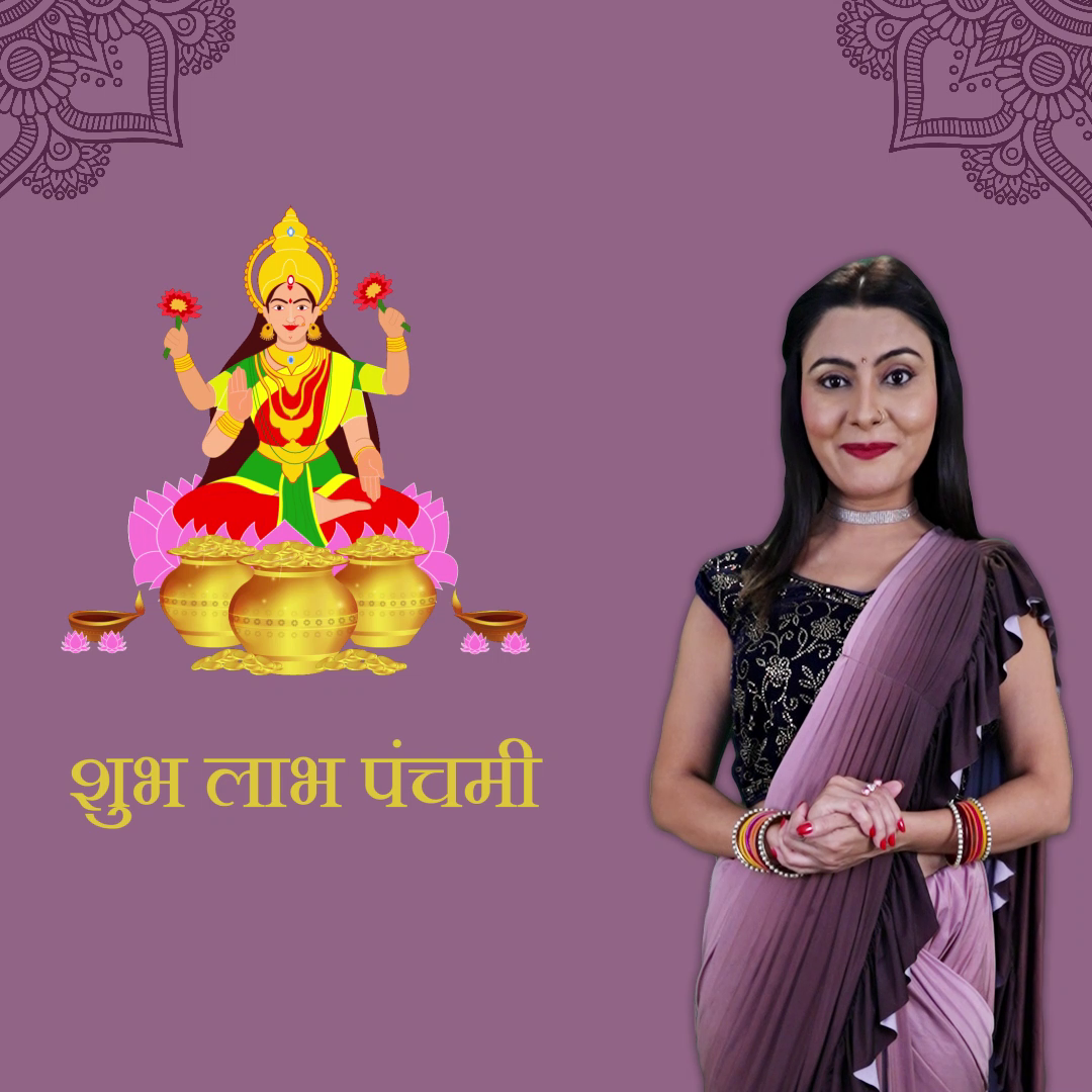 A woman celebrating Shubh Labh Panchami with an illustration of Goddess Lakshmi