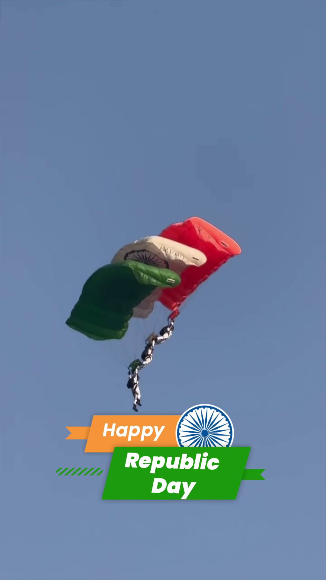 Indian Air Force personnel skydiving with tri-color parachutes during Republic Day celebrations