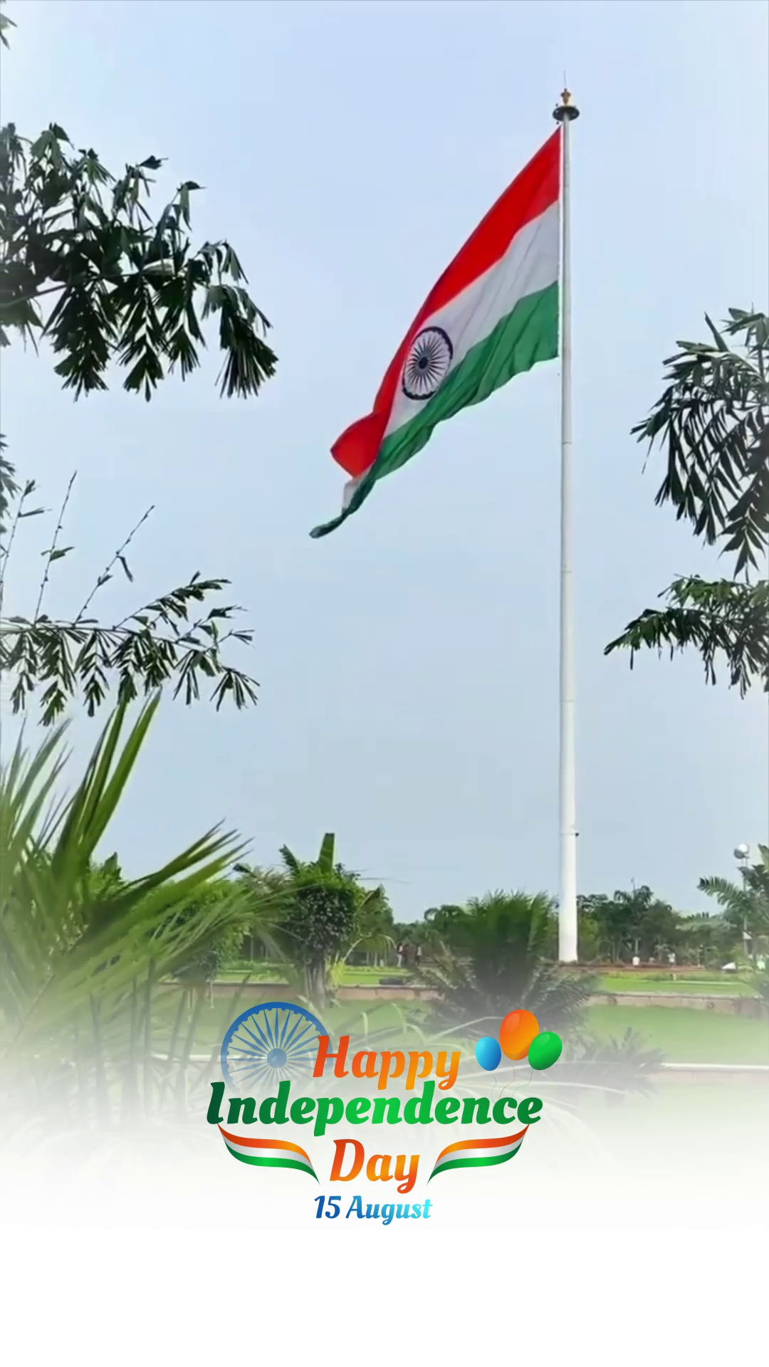 Indian national flag waving proudly against a clear sky for Independence Day celebration