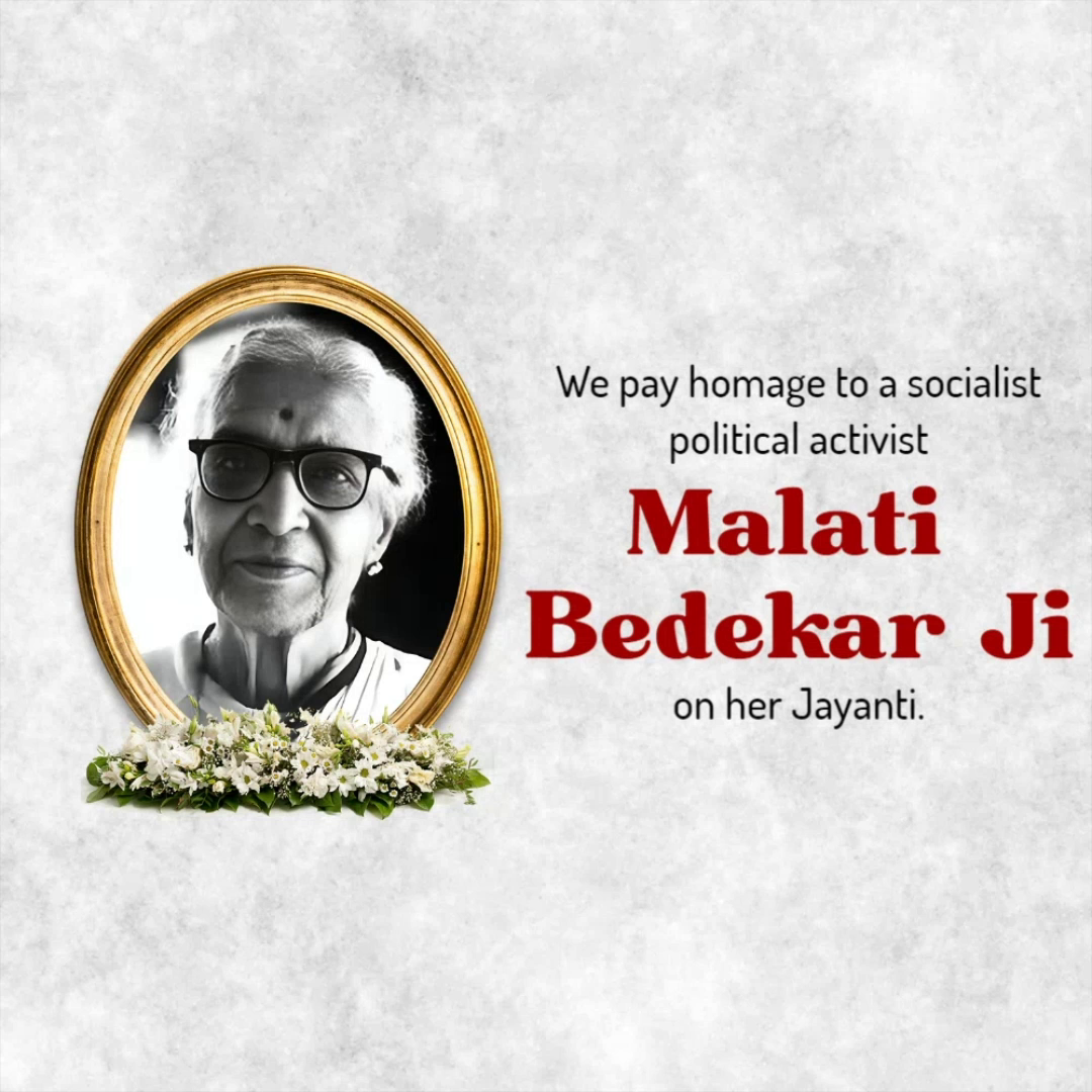A portrait of Malati Bedekar Ji in a golden oval frame with flowers for her Jayanti