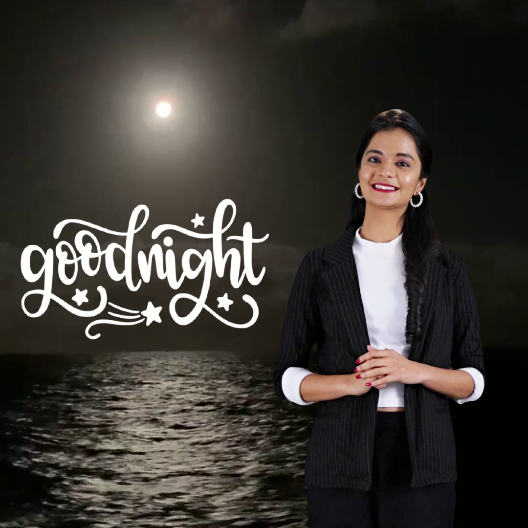 A professional woman in a suit standing against a moonlit ocean background with the text Goodnight