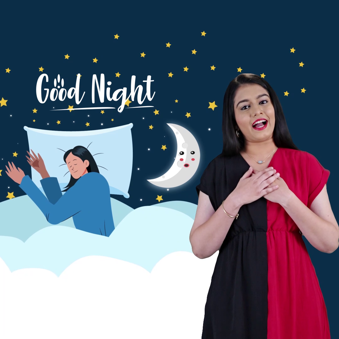 A young woman standing next to a night-themed illustration of a person sleeping under the moon and stars with Good Night text.