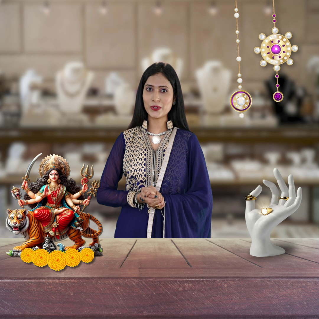 A woman presenting Durga Puja festive jewelry in a store with Goddess Durga idol and jewelry display