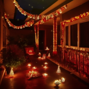 A balcony decorated with marigold garlands and glowing diyas during Diwali festival