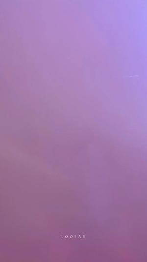 A smooth gradient background transitioning from soft light purple to a deeper mauve shade with the Loofar logo at the bottom.